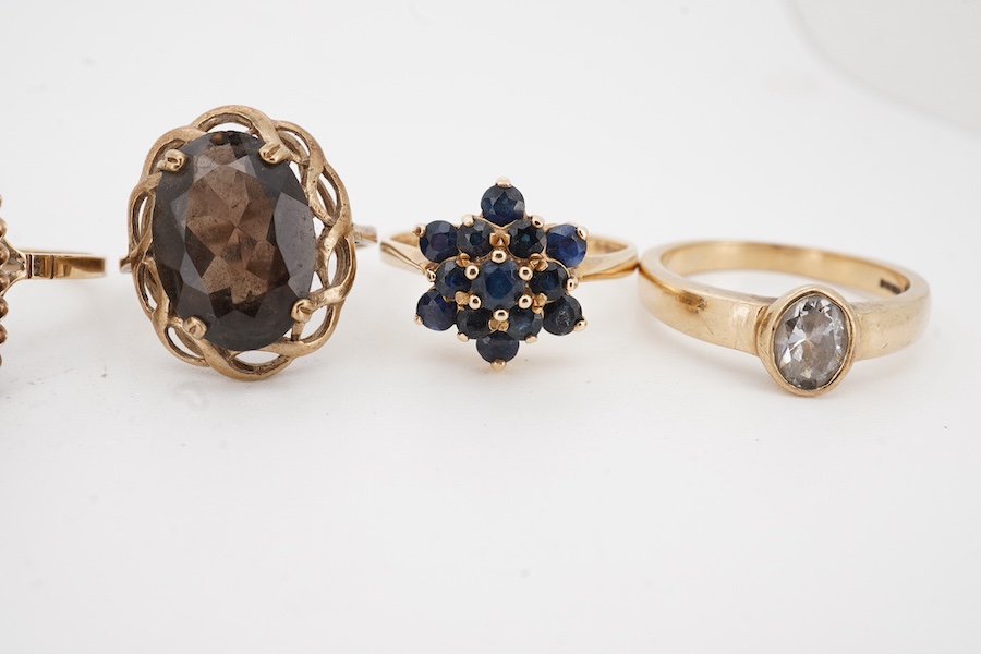 A collection of six gold rings